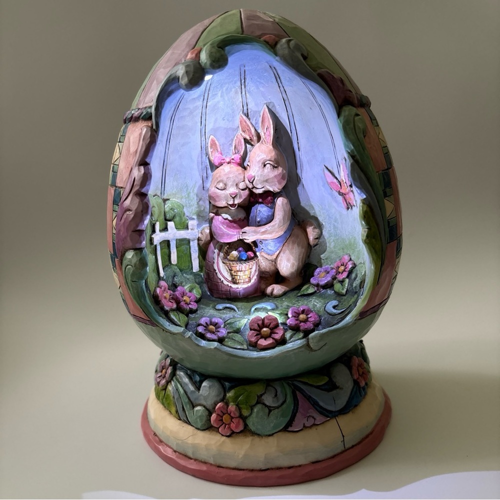 Charming Easter Egg Sculpture with Bunnies